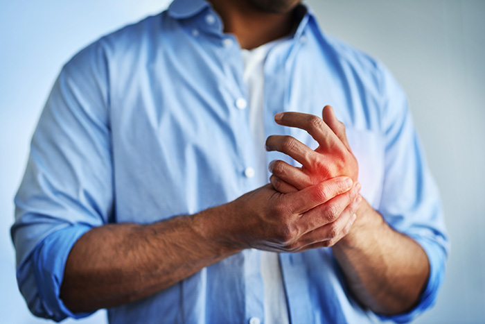 Neurologist providing nerve treatment to a patient in Houston, TX